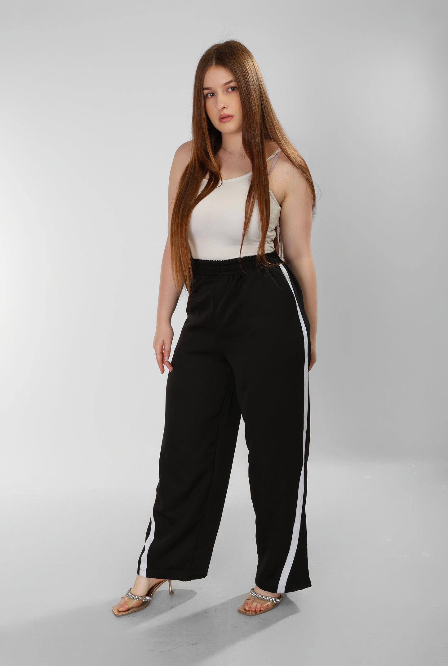 Black Soft-Touch Pants with White Side Stripes – Effortless Street Sophistication