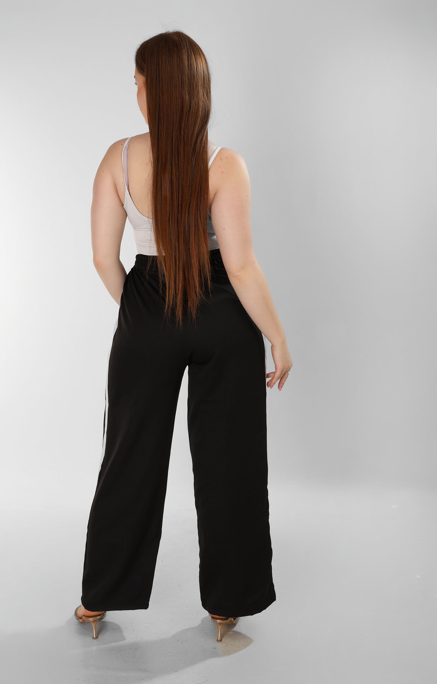 Black Soft-Touch Pants with White Side Stripes – Effortless Street Sophistication
